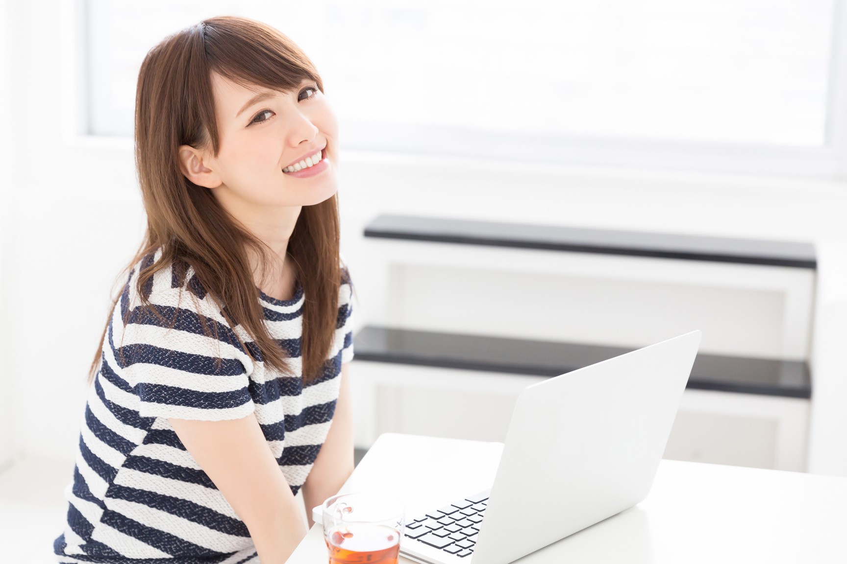 Japanese woman using a PC